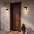 Two compact Bubble Glass wall lights beside a front door. Each fixture is 12.2 inches tall; see the size diagram for exact measurements.