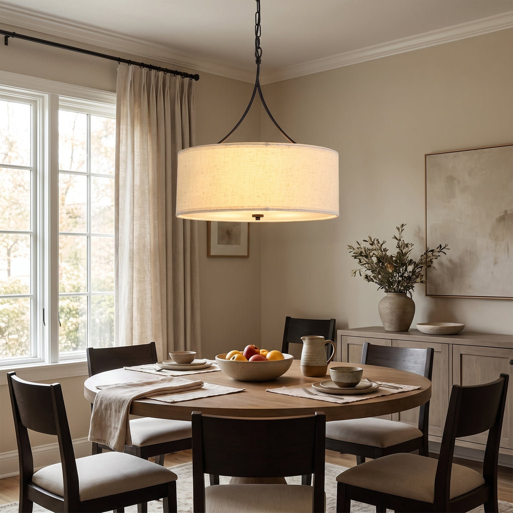 Linen Drum Three-Light Pendant styled in a home setting