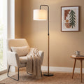 Lior Wood-Accent Floor Lamp styled in a home setting