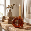 Loop Amber Glass Candle Holder styled in a home setting
