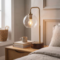 LuxeRay Arched Glass Table Lamp styled in a home setting