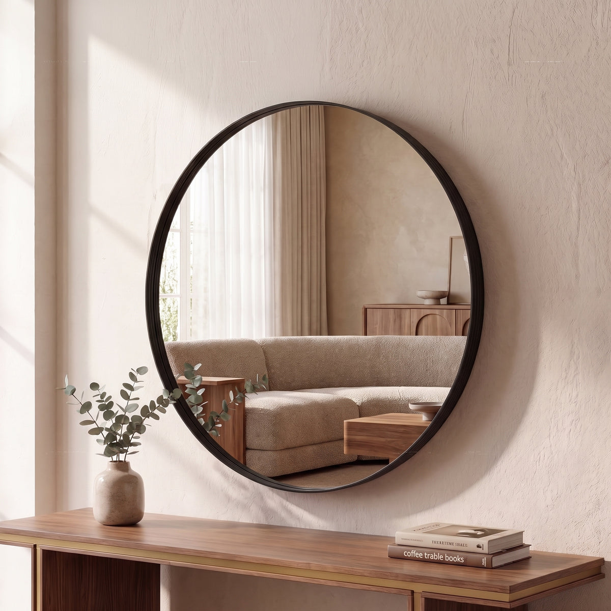 Round Black Metal Mirror — 24 Inch styled in a home setting
