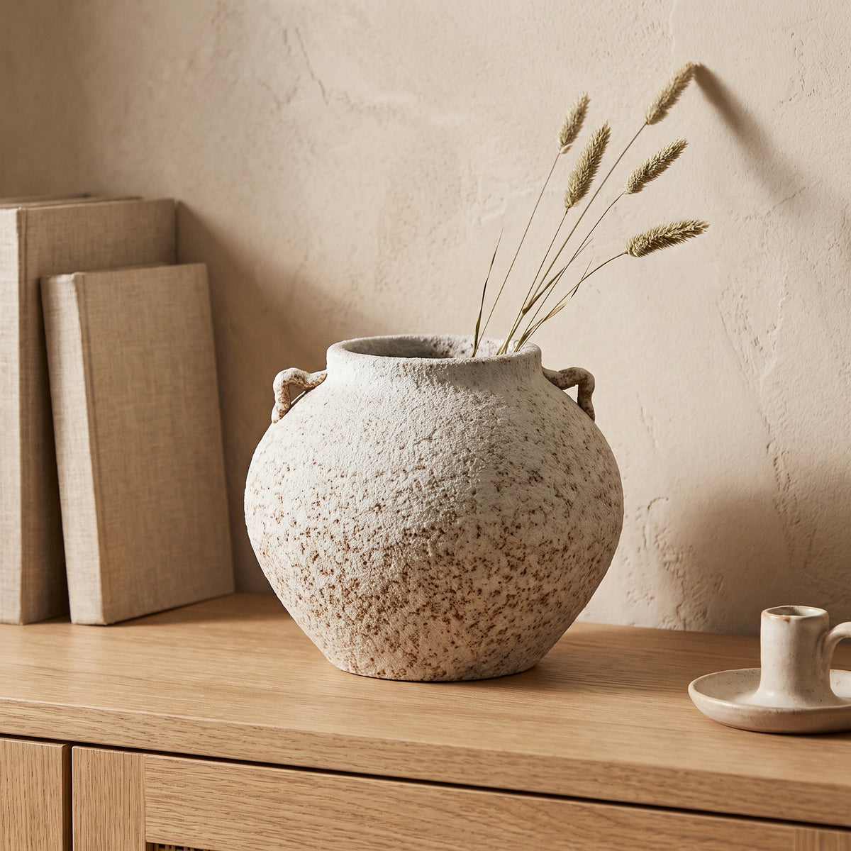 Terra Textured Pottery Vase styled in a home setting