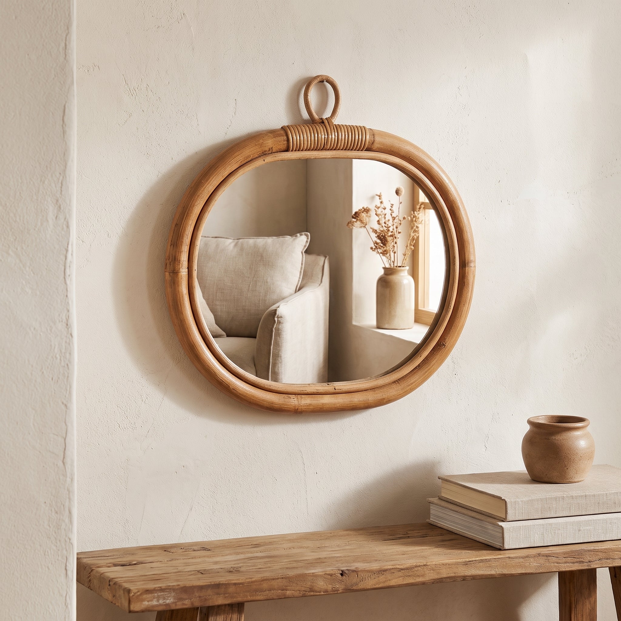 Woven Apple Wall Mirror styled in a home setting