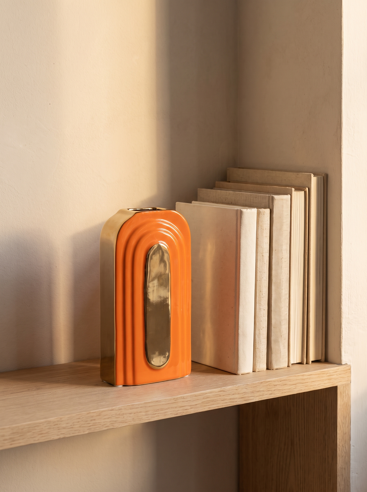 Arc Orange Ceramic Vase in a home setting — style it with restraint