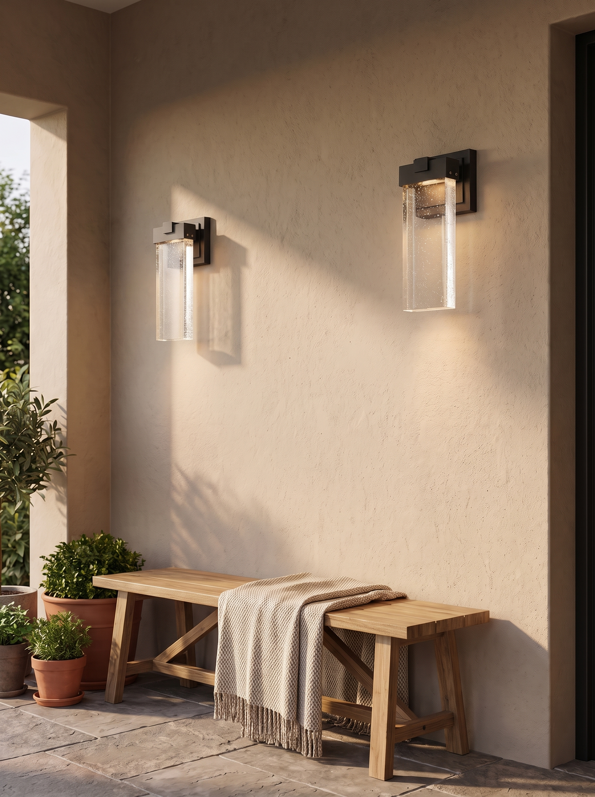 Bubble Glass Outdoor Wall Lights — Set of 2 in a home setting — a glow with a light sensor