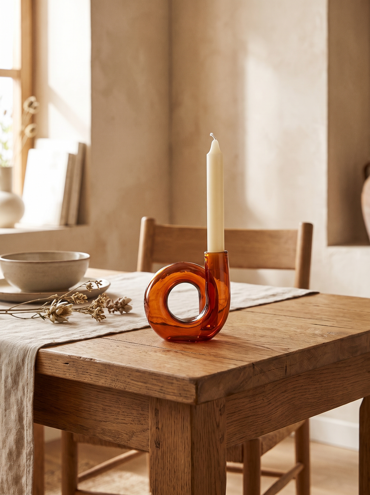 Loop Amber Glass Candle Holder in a home setting — a small amber accent