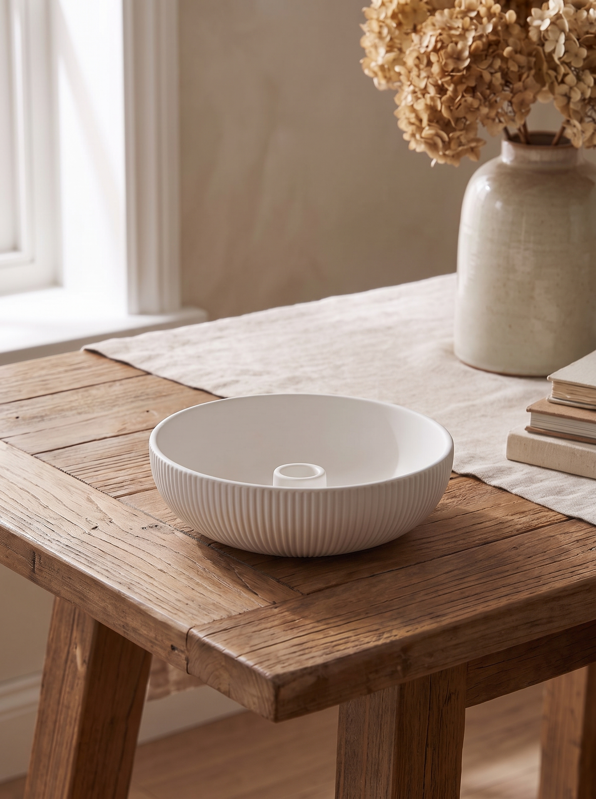 Porcelain Bowl Candle Holder in a home setting — a small object between uses