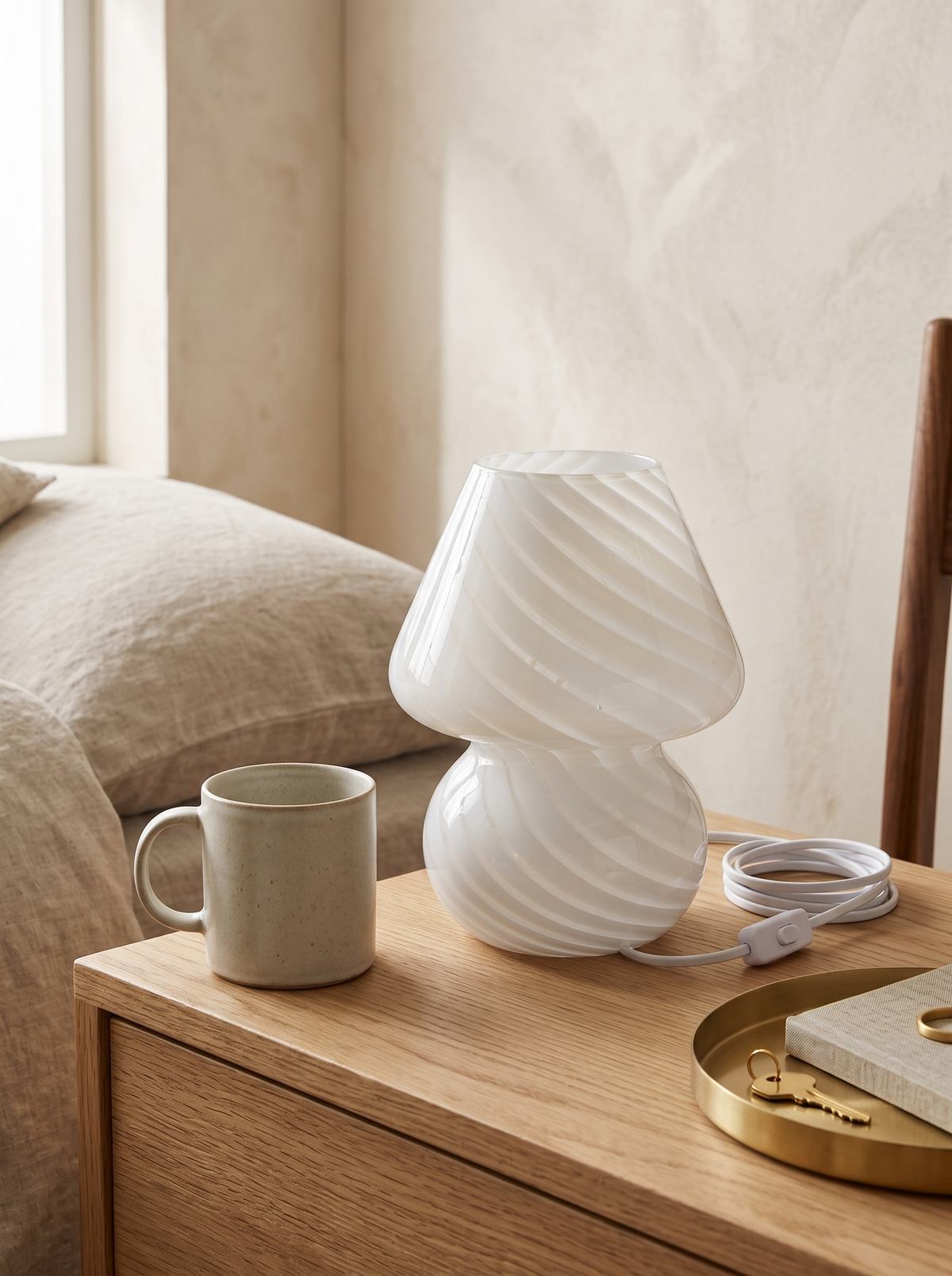 Spiral Glass Bedside Lamp in a home setting — texture in the curves