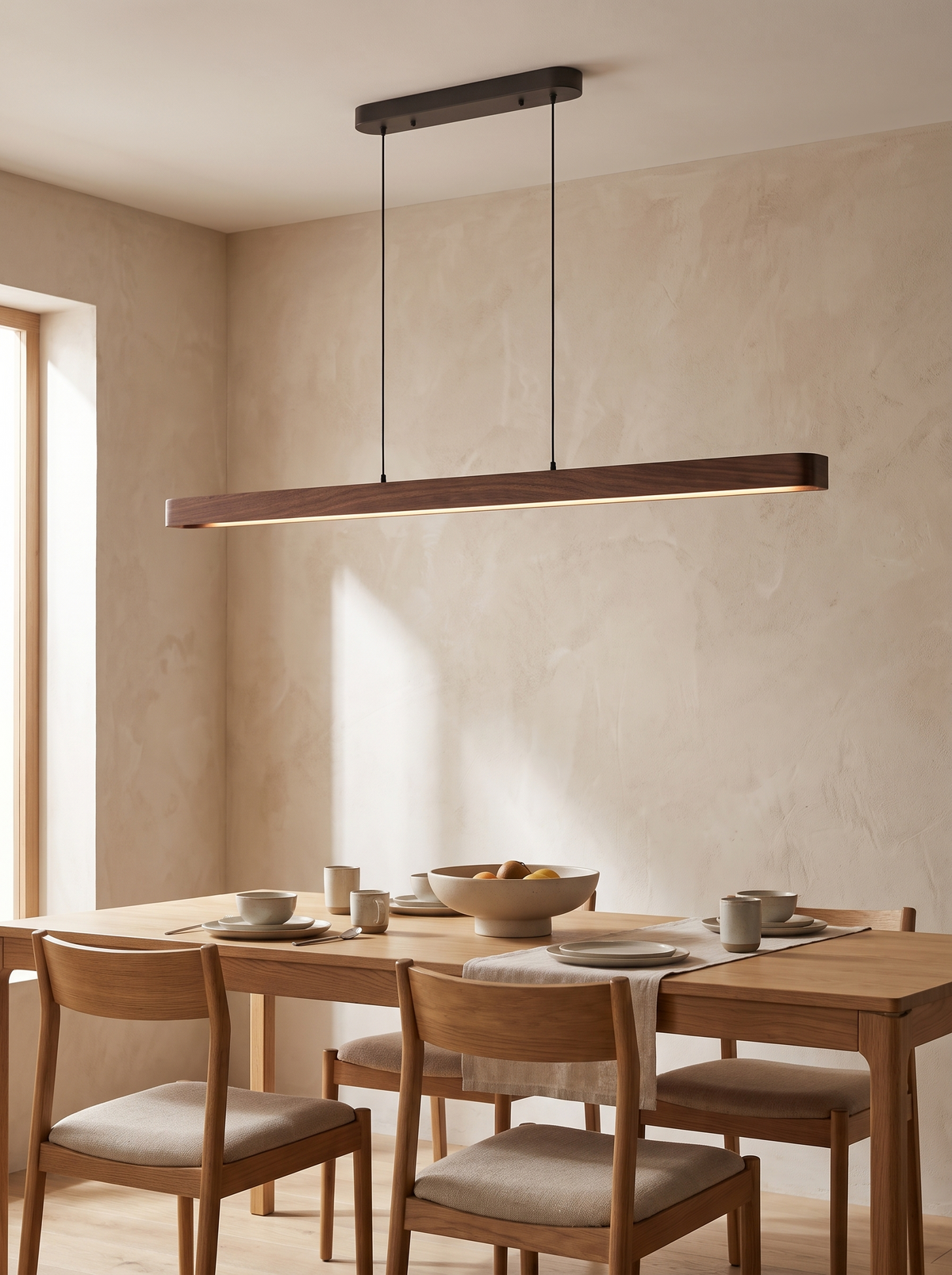 Walnut Linear LED Pendant — 51 Inch in a home setting — warm wood, simple form